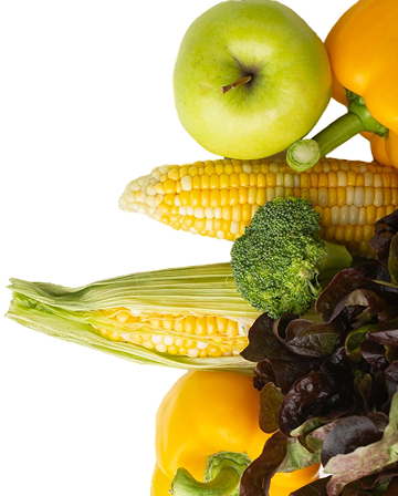 Green apple yellow peppers corn broccoli and red lettuce