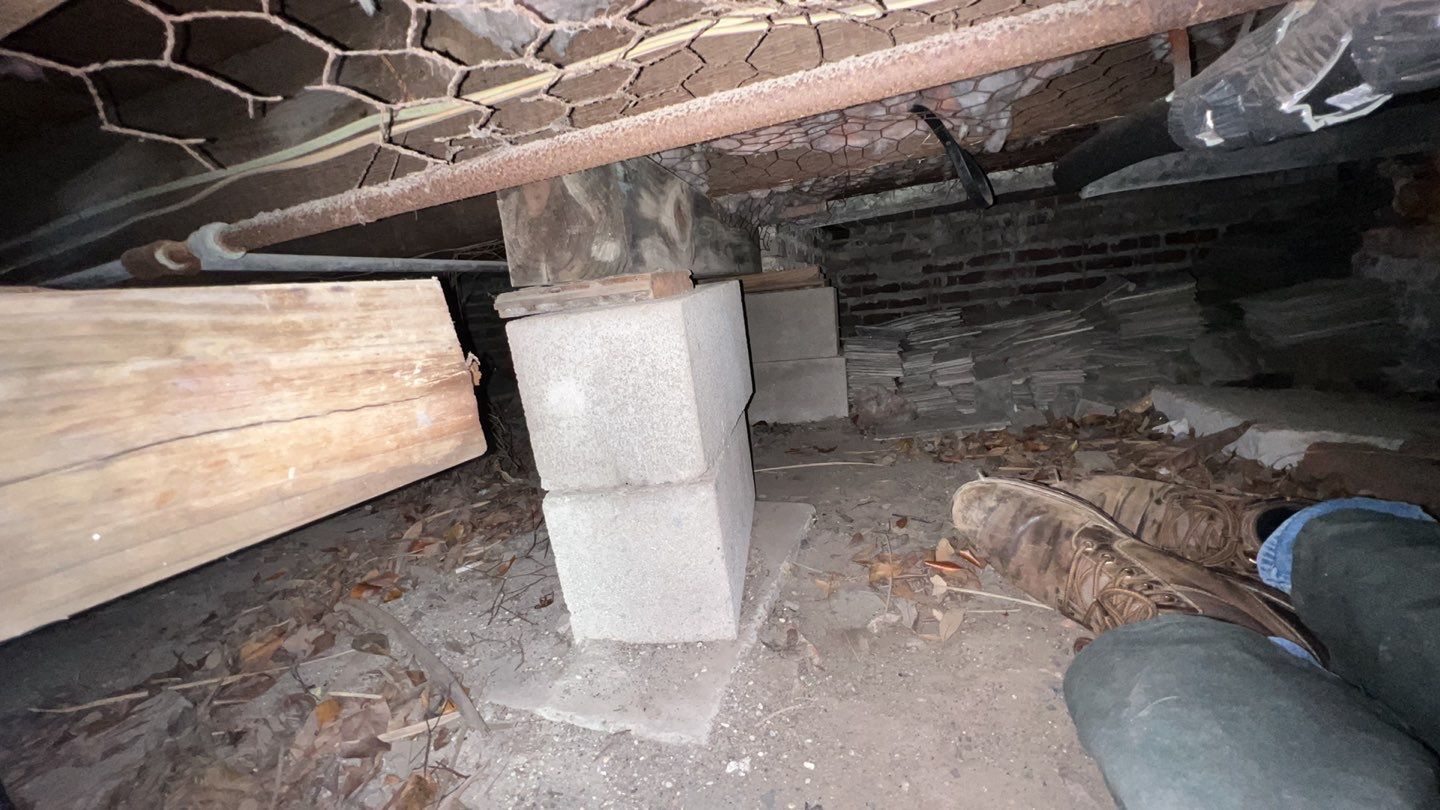 Keywords used: Basement, Foundation Repair


Description: A person's feet are on the floor of a basement undergoing foundation repair.